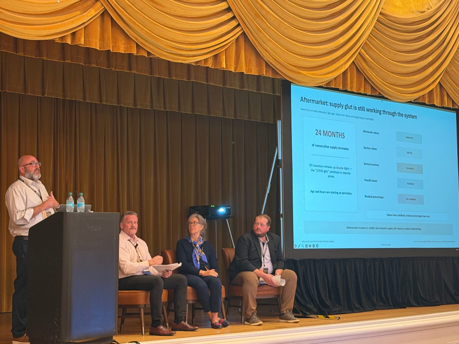 A panel discussion on stage at AVS